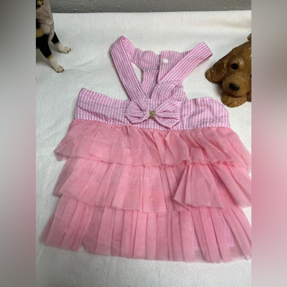 Pink and white striped ruffled dog dress with suspenders